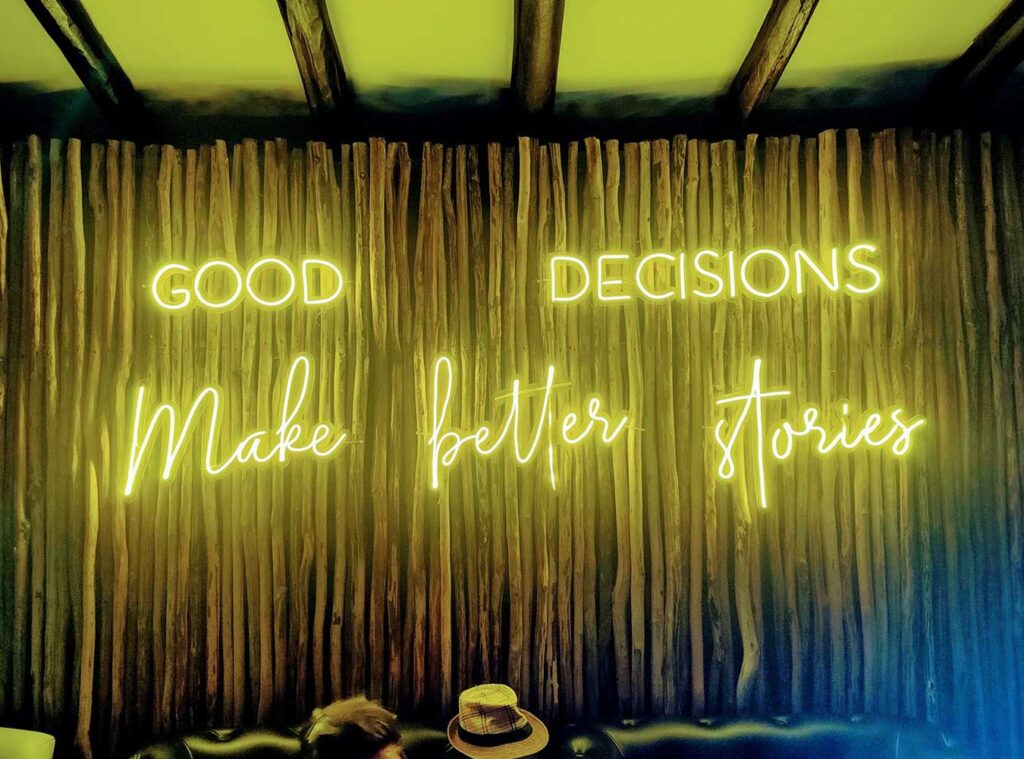 Good Decisions Make Better Stories Sign in bar at El Dorado Seaside Suites