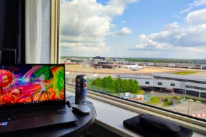 Laptop with VPN overlooking airport