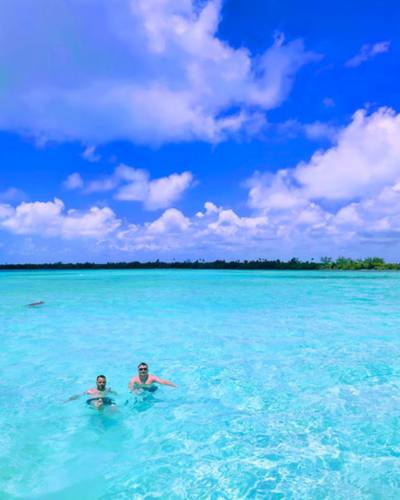 Luke and Russ in blue waters at Sian Ka'an biosphere 
